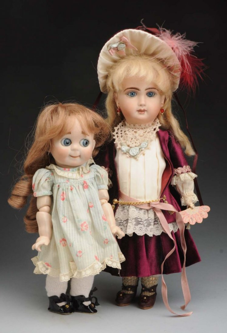 Lot of 2: Reproduction Dolls.: Jumeau with bisque head incised “1977 Vernon Seeley” with composition body and very nicely dressed; JDK 221 googly by M. Look with bisque head and jointed composition toddler body. Condition (Very