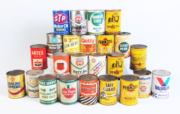 Lot of Assorted Oil Cans.: Box lot of one quart oil cans. Mixture of metal and composite cans. All cans are empty. Condition (Fair - Good). Size Each: 5 - 1/2" T.