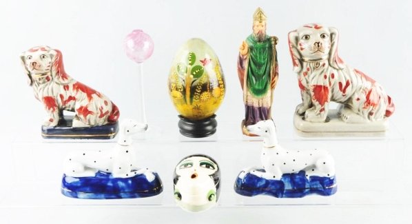 Lot of 8: Assorted Figures.: Includes a pair of staffordshire dogs, and two other staffordshire like dogs, a string holder, an egg, and others. Condition (Excellent). Size Largest: 9" T.