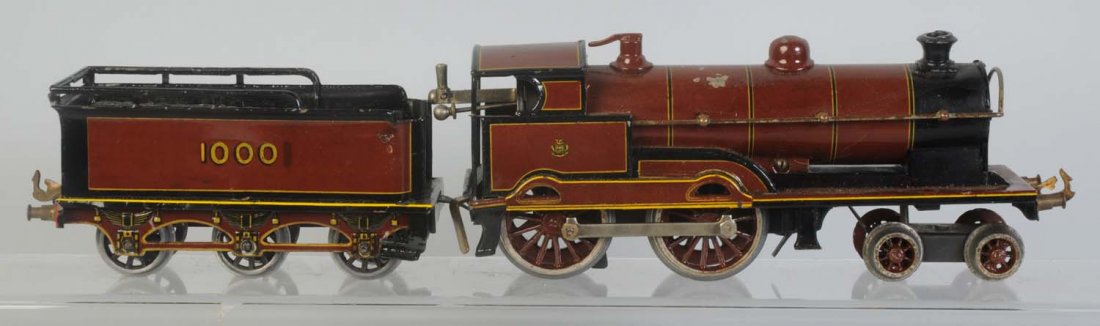 European Outline No.440 Wind-up Locomotive.: Complete and all original. Has some scratches and paint chips on boiler. Tender very clean and attractive. Condition (Very Good).