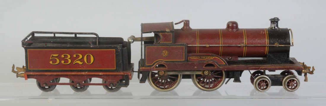 Hornby 440 King George V.: Slight bend in the cab. Has some scratches and paint chips on locomotive. Is a wind-up locomotive. O Gauge. Tender is nice and straight complete and original. Condition (Very Good).