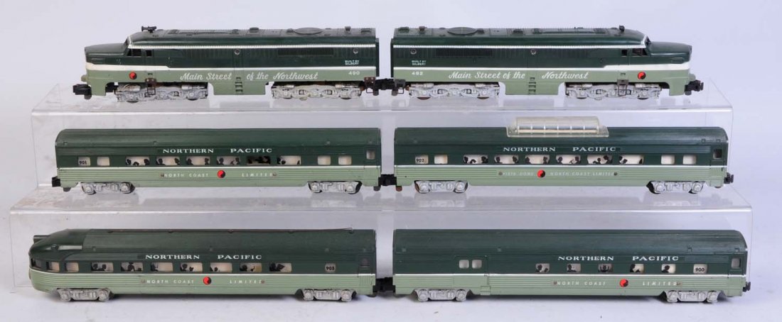 American Flyer 3Digit Northern Pacific Set.: Six pieces. No.490 power unit complete and all original. No rust. No.492 dummy unit needs ornamental horns on roof. Otherwise complete and all original. No.903 observation car complete and all origina