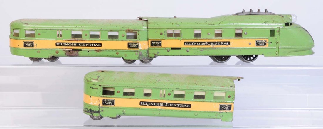 American Flyer Illinois Central Tin Litho Set.: Streamliner Power unit has a hole through one side that shouldn't be there. Needs new wheels. Dirty has scratches and paint chips. Illinois Central pullman car has scratches and paint chips. Observati
