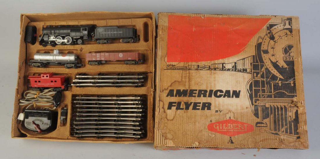 American Flyer No.20123 Set in Box.: Set includes N.21160 steam locomotive and tender. Broken step on pilot. Otherwise complete and excellent. No.24310 Gulf tank car complete. No.24110 PRR gondola complete. No.24610 caboose badly broken.
