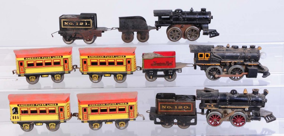 American Flyer Pre-war O Gauge Locomotives.: Locomotives tenders and passenger cars. Includes American Flyer O gauge cast iron electrically powered steam locomotive. Needs wheels. Has scratches. American Flyer O gauge wind-up locomotive. Complet