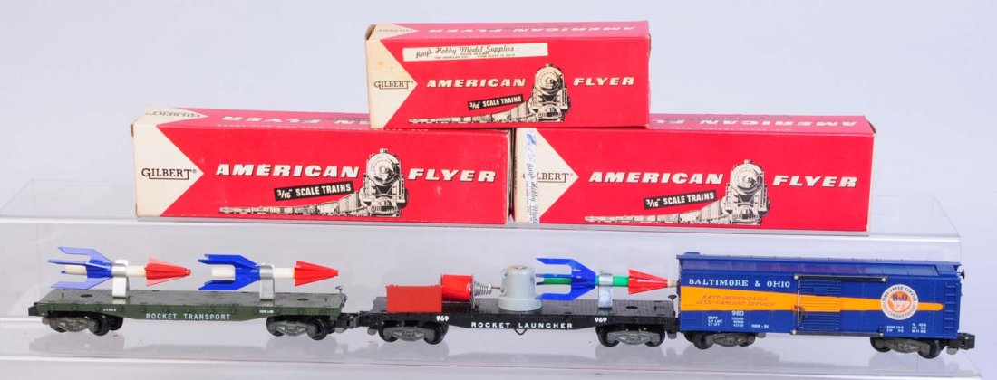 Lot of 3: American Flyer Freight Cars.: No.980 BNO box car. Complete and all original. Very clean and attractive. Good, square, original box with all flaps. No.25045 Rocket launcher in original box. Car is complete and all original with ori