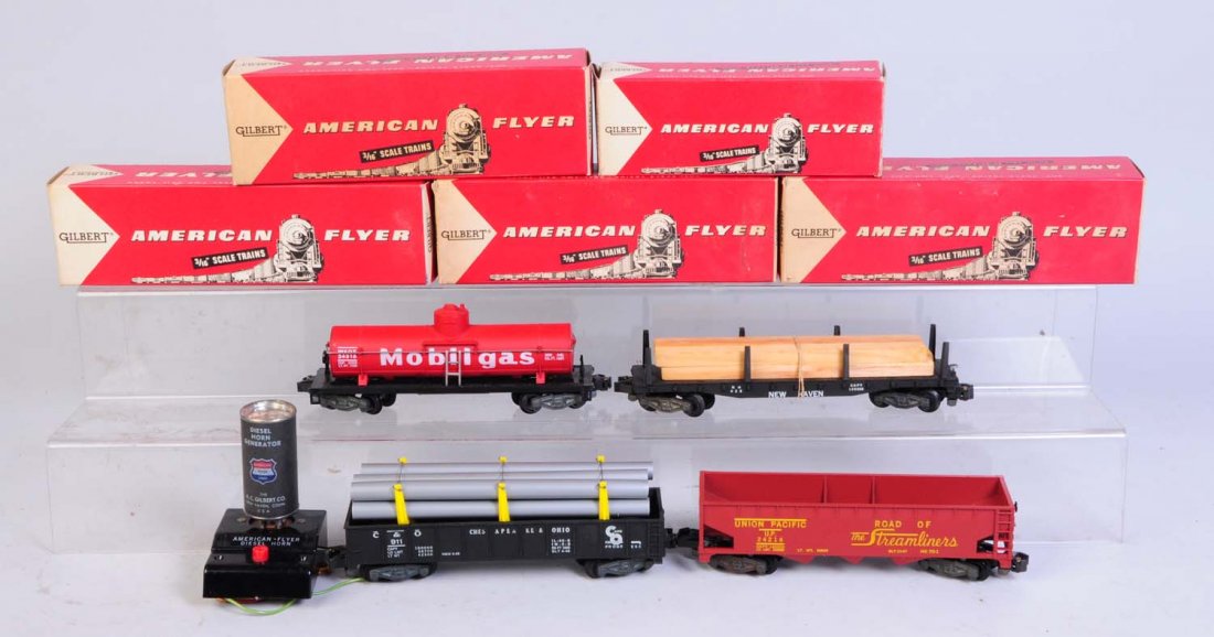Lot of 4: American Flyer Freight Cars.: In original boxes. Includes No.2416 Mobile gas tank car. In original box. Complete and all original. Original box is complete and has all flaps. No.928 lumber car in original box. Complete and all ori