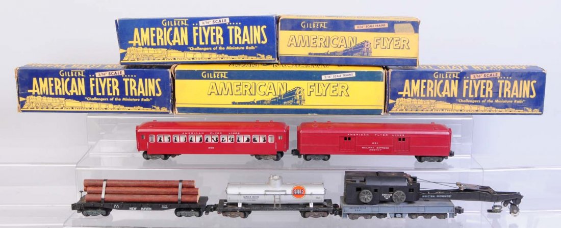 Lot of 5: American Flyer Rolling Stock.: Includes No.925 Gulf tank car complete and all original. Excellent throughout. No.944 crane car is complete and all original. Has rough original box. No.928 New Haven flat car with log load which is i