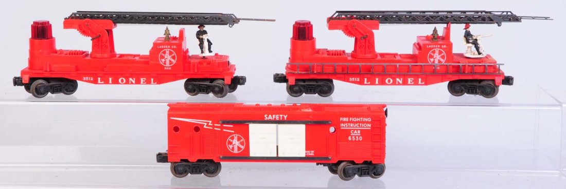 Lionel Fire Fighting Car Lot.: Includes No.3512 fire ladder car. Complete and all original. Man has some paint loss on face and head. Little rust on ladder. No.6530 Fire fighting instruction car. Has a little rust on axles. No.3512