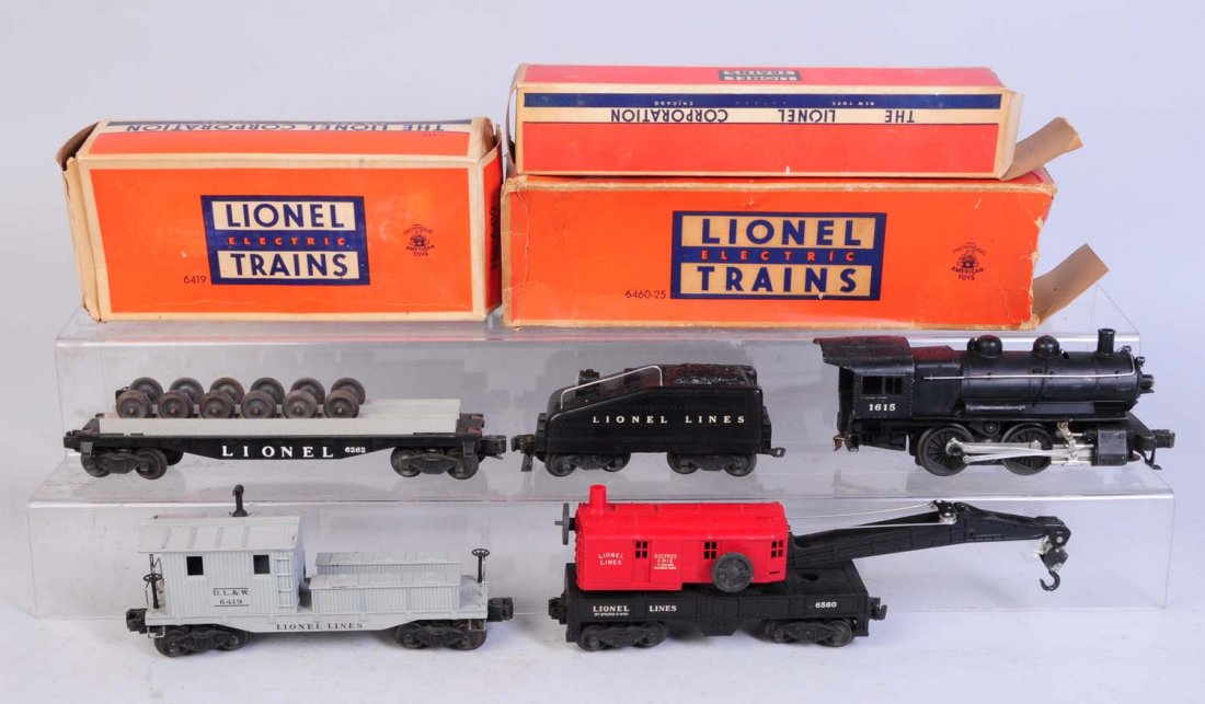 Lionel No.1615 Locomotive & Tender.: No.1615 Steam locomotive is complete and all original. Very clean. No.1615T tender is complete and all original. Some one installed a back up light in rear. No.6419 work caboose in original box. Has a