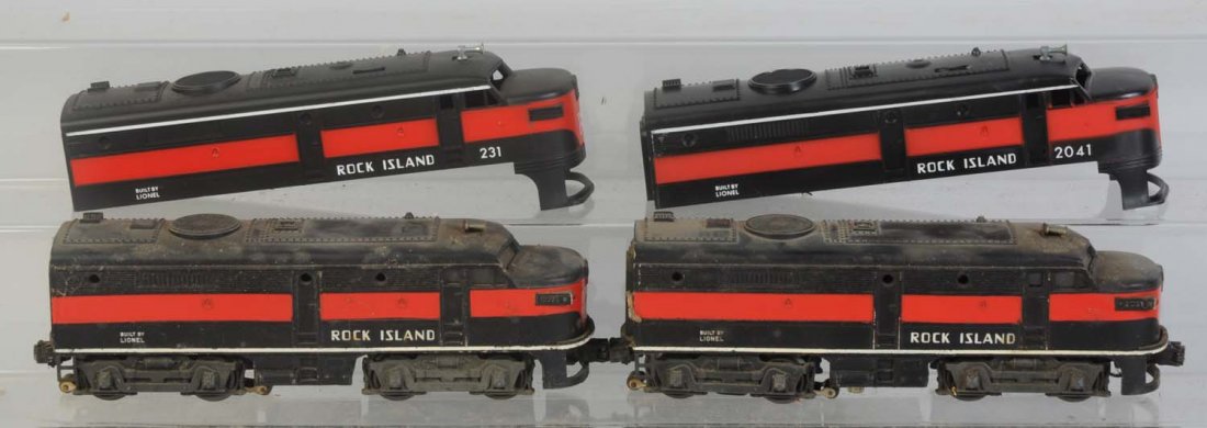 Lionel No.2031 Rock Island Alco Assortment.: No.2031 Rock Island Alco needs cleaning. Powered unit. Dummy unit is dirty needs cleaning. Has significant paint loss on the frame. No.231 Rock Island Alco shell coupler support bar is intact. Is comp