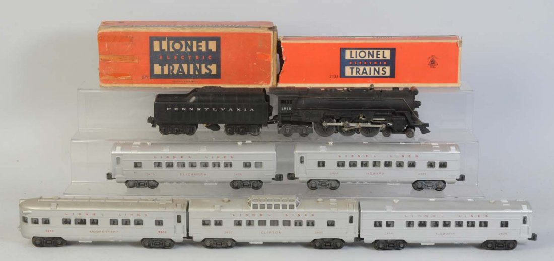 Lionel No.2065 L&T with Red Letter Passenger Cars: No.2065 steam locomotive is complete and all original. Has a few minor paint chips. No.2671 Pennsylvania Rail Road whistle tender needs cleaning. No.2432 Clifton vista dome car is dirty needs cleaning