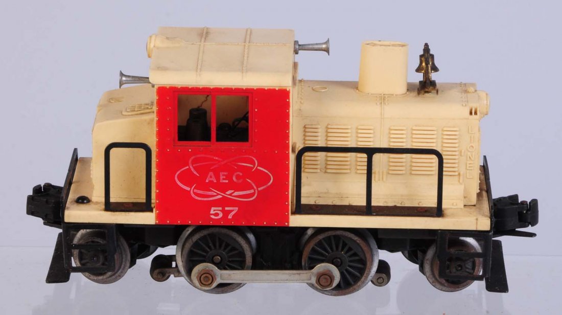Lionel No.57AEC Switcher.: Window struts on both sides are cracked but present. AEC lettering is worn. Small screw crack where body mounts to the frame. Dirty needs cleaning. Condition (Good).