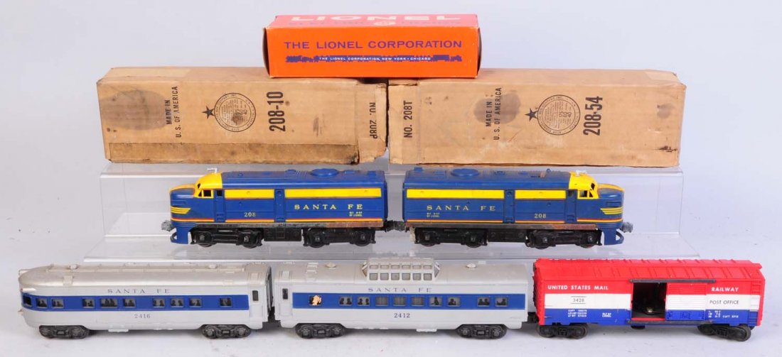 Lionel Santa Fe Alco Set.: Includes No.208 powered unit in original box. Has some paint chipping on the yellow. Has scratches and rust on axles. In good condition. Original box has seen some water damage. No.218 non powered dum