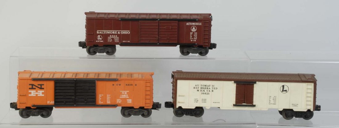 Lot of 2: 6468 Box Cars & 3662 Milk Car.: No.6468 Tuscan B&O box car rare. Is complete and all original. No.6468-25 New Haven box car. Has scratches. No.3662 brown roof automatic milk car has some rust on frame. Condition (Very Good).