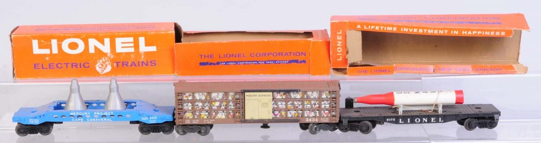 Lot of 3: Uncommon Lionel Freight Cars.: Includes No.6413 Mercury project capsule car. Complete and all original. Has some rust on wheels and axles. Has original box which is discolored and stained. No hold downs for the capsules. No.6175 US