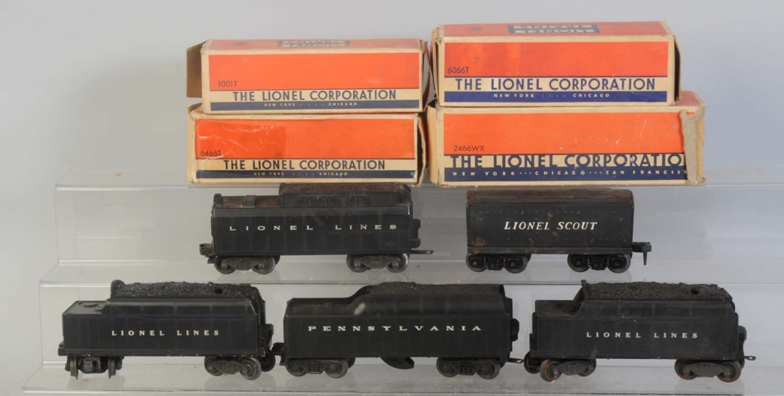 Lot of 5: Assorted Loose Lionel Tenders.: No.2046 tender with PRR lettering has some corrosion on trucks. No.6466T tender in original box. Is complete and all original. Original box is rough and missing an end. No.1001T Lionel Scout tender ha