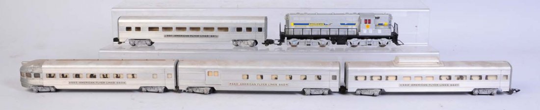 No.370 GP-7 with 4 Aluminum Passenger Cars.: No.370 GP-7 is set up for link couplers. Has some flaking on the decals. Some scratches no rust. No.663 aluminum observation car could clean to a better grade. No.661 pullman car could clean to a bett