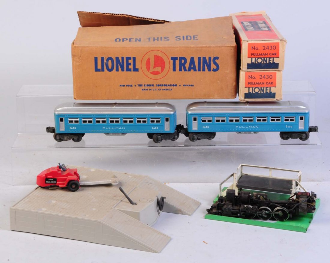 No.460 Piggy Back Transport Set, Cars & Others.: No.462 piggy back transport set is dirty needs cleaning. No car. Has good square original box. Chassis for double "O" Lionel Hudson missing rear truck. No.3462P milk car platform. Has some scratches. 