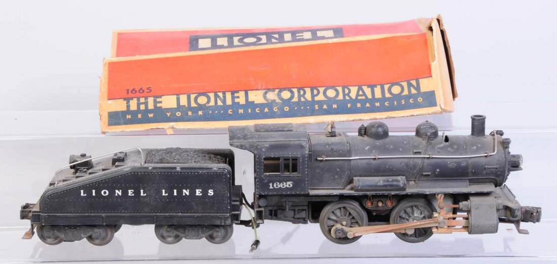 Lionel 1665 Steam Locomotive.: With No.2403 B Bell. Locomotive is dirty. Needs cleaning. Has scratches and paint chips. Tender No.2403 B is complete and all original but needs cleaning. Has a very partial original box. Condition (V