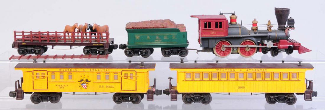 Lionel 4 Piece General Set.: Includes No.1872 steam locomotive with smoke. Has some rust on metal parts. Broken cab roof. No.1862 tender has some rust on the frame. No.1877 Horse car is missing at least four pieces of fencing. On