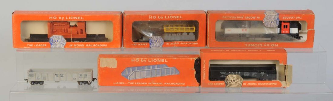 Lionel HO Assorted Trains.: No.0865-225 Grey Michigan Central Gondola. Has a little rust on the trucks. No.0591 New Haven rectifier in original box. This locomotive is complete like new in original box. Box is missing flaps. No.