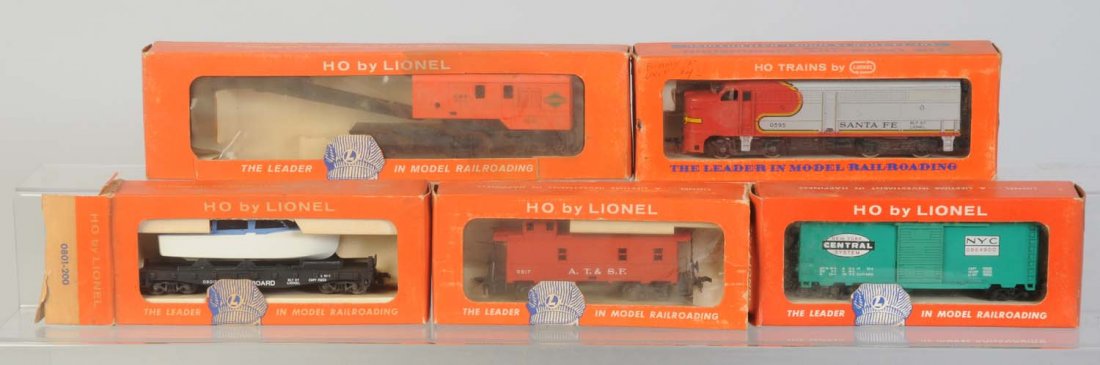 Lionel HO Assorted Trains.: No.0864-935 New York Central Box car in original box. Car is complete like new in the original box. No.0801-200 Seaboard flat car with boat load. Car is complete like new in original box. Box is missi