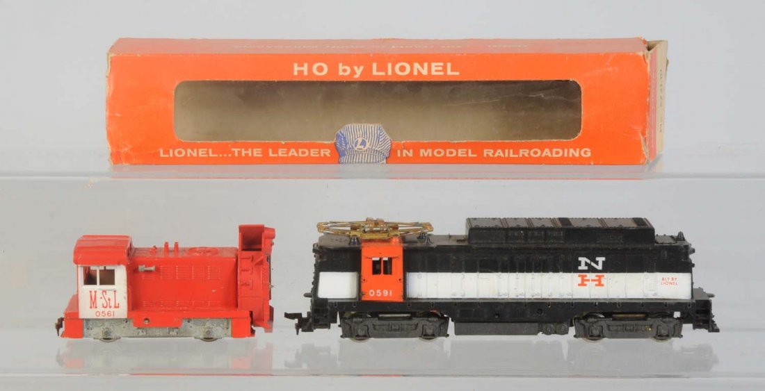 Lionel HO Trains.: No.0591 New Haven rectifier locomotive. Is missing one coupler. No railing but in otherwise excellent condition. No.0561 Minneapolis Saint Louis rotary snow blower. Complete all original, and in excel