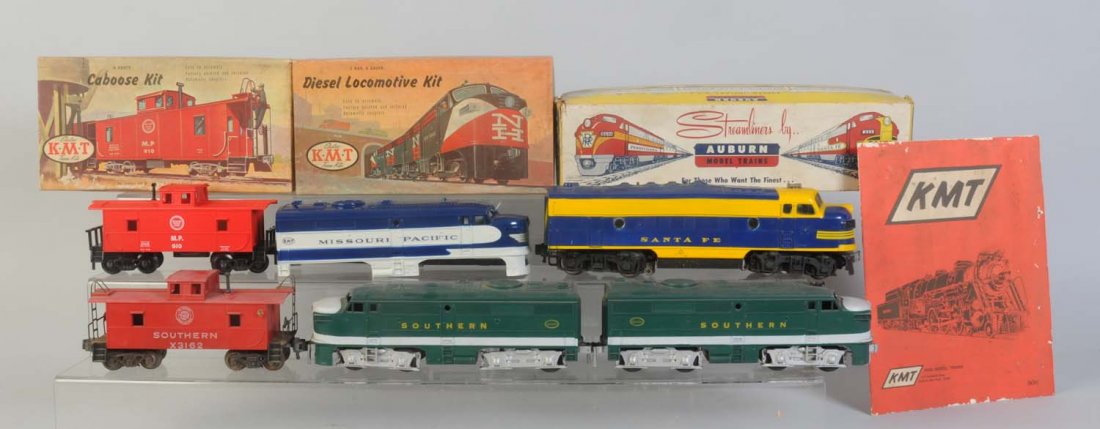 Kusan & Auburn Crane Lot.: Kusan Southern AA units. Dirty but could clean to better grade. Missing a wheel set. Both are dummies. In Good condition. Southern caboose has incorrect die cast trucks. KMT Santa Fe F7 power unit. Co