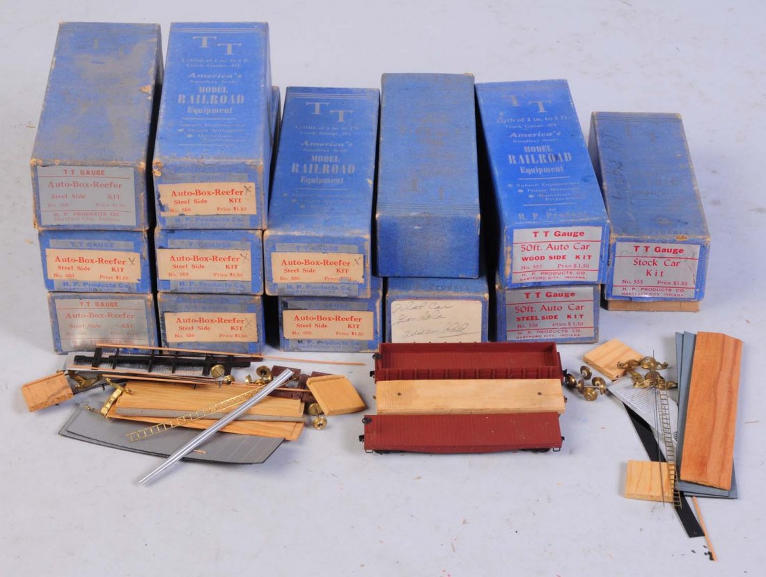 Lot of 13: TT Gauge By H.P. Products.: All in original boxes. Includes one wooden gondola no lettering. One wooden flat car no lettering. One unpainted flat car no lettering. Two automobile box car kit. 50 foot automobile box car kit. Stoc