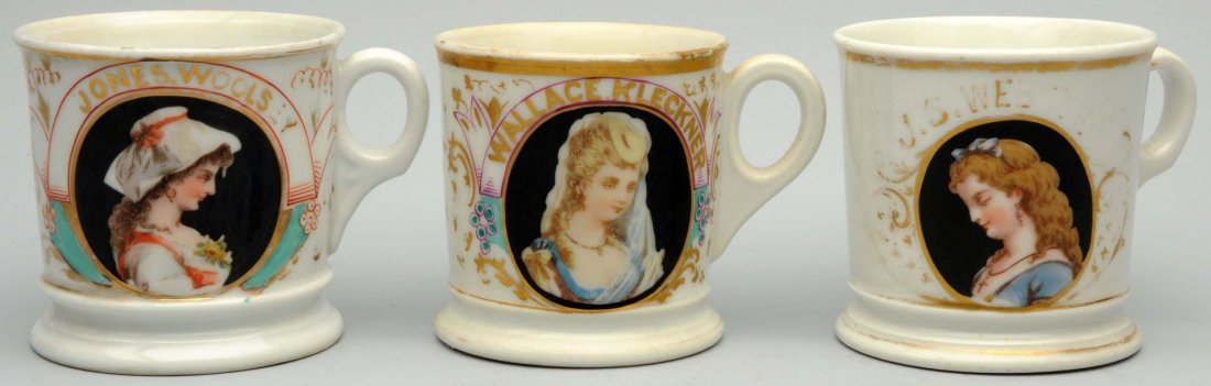 Lot of 3: Shaving Mugs.: All with portraits of ladies wearing Victorian-style dresses. Name on mugs include, Kleckner, Webster and Woolsey. Two mugs are stamped "CFH", and one is stamped "D&C". Condition (Very Good). Size Eac