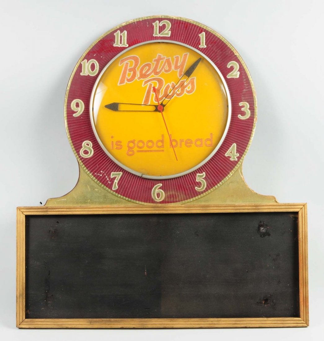 Betsy Ross Bread Clock.: Electric. Minor scrapes. With menu board on bottom. Condition (Excellent). Size 32" T.