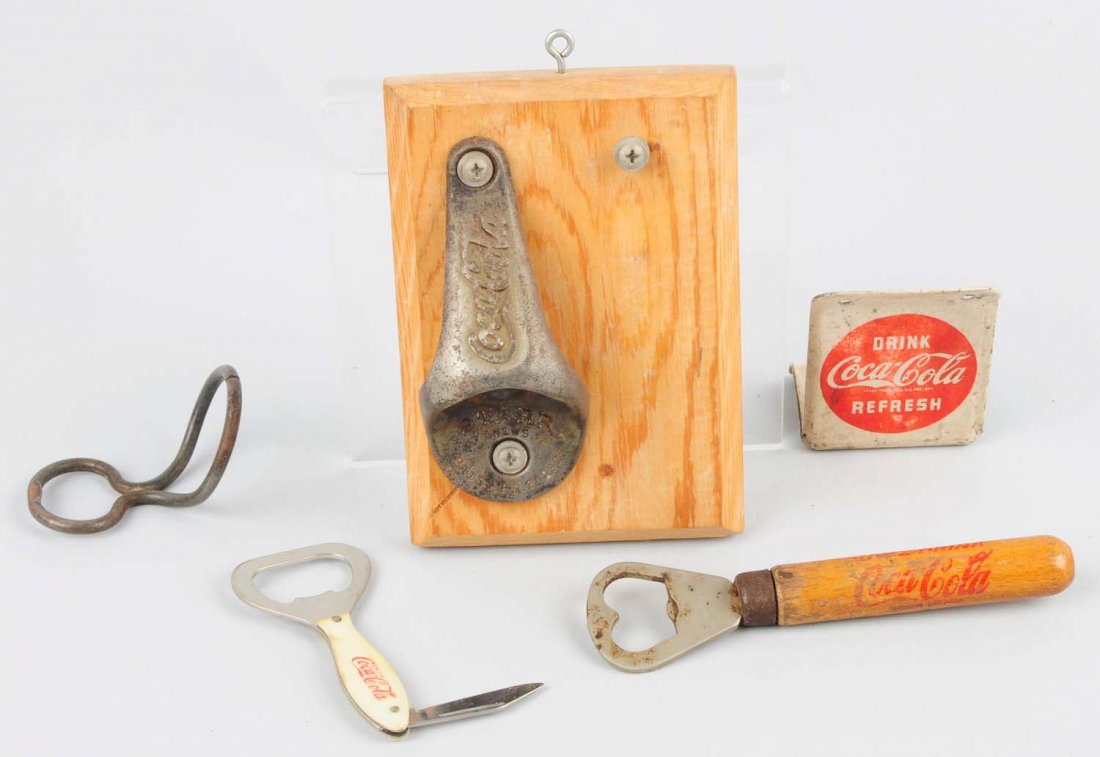 Lot of 5: Coca-Cola Bottle Openers.: Average overall wear. Condition (Very Good). Size Largest: 5 - 1/4" L.