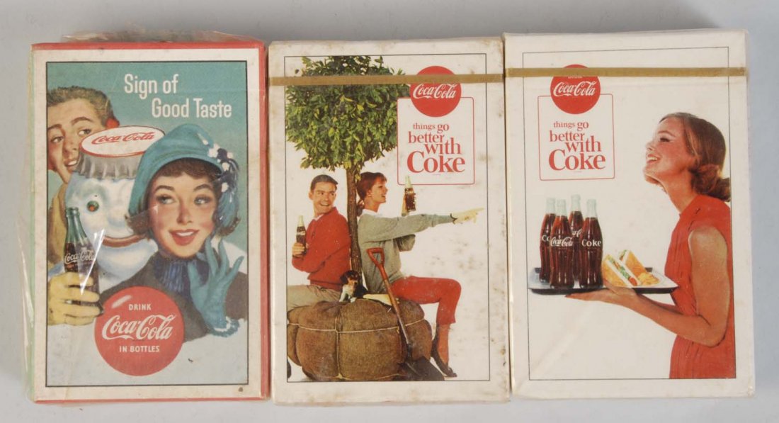 Lot of 3: Decks of Coca-Cola Playing Cards.: All are 1960s and still sealed and unopened. Condition (Excellent). Size Each: 3 - 1/2" L.