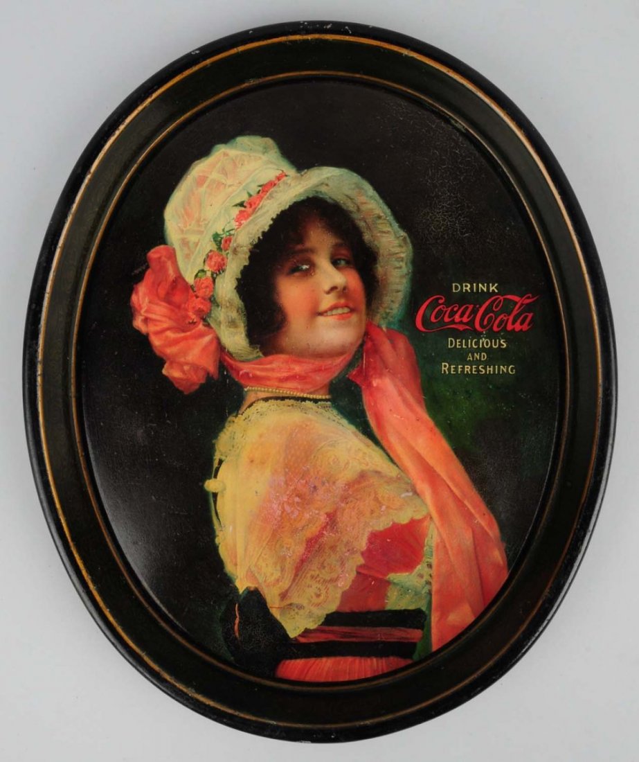 1914 Coca-Cola Oval Tray.: Has been clear coated with color touchup and still displays well with wear. Condition (Good). Size 15" L.