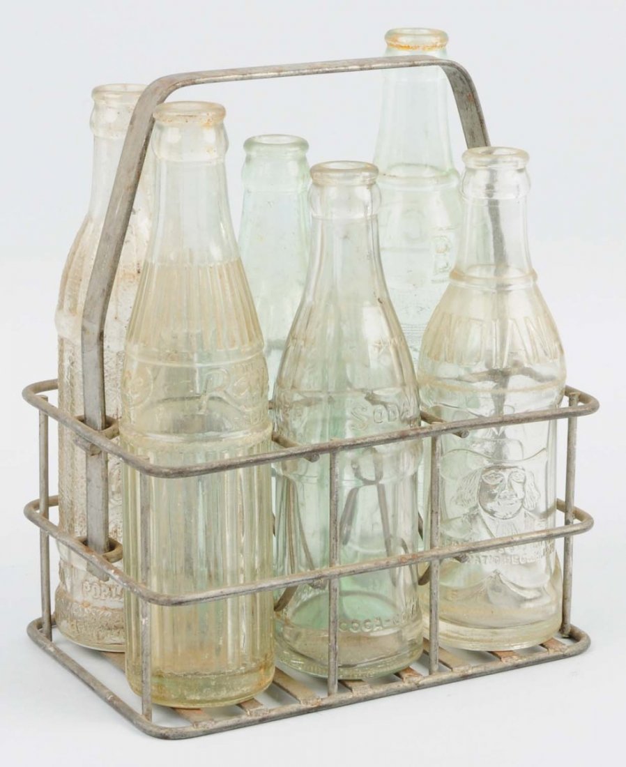 Oklahoma Coca-Cola Metal Carrier with Bottles.: Average wear with some interesting bottles included. Condition (Very Good). Size 10" T.