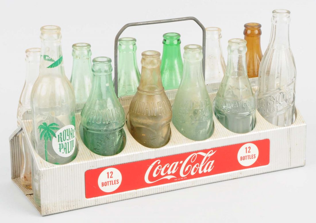 1950s Coca-Cola 12 Pack Aluminum Carrier.: Has assorted bottles. Very light wear on the carrier. Condition (Excellent). Size 16" L.