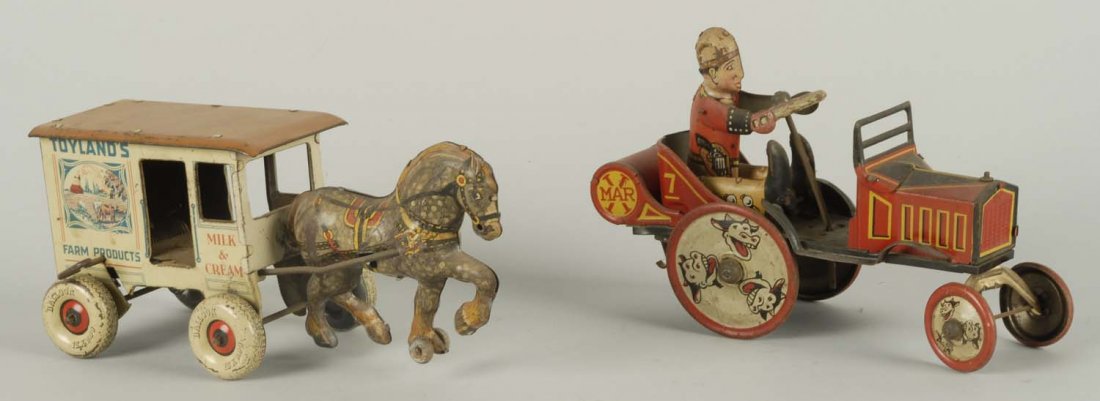 Lot of 2: Marx Tin Wind-ups.: Including a horse drawn Toyland Milk and Cream dairy van. Toy is all original. Does have significant wear and corrosion. Second toy is a tin wind-up whoopie car. Toy is all original. Could clean to a 