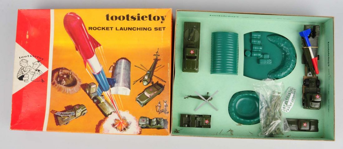 Tootsietoy Rocket Launching Set.: Set is in original box. Appears to be mostly complete. Does have original inserts. Condition (Very Good). Size Box: 17 - 3/4" x 13 - 3/4".