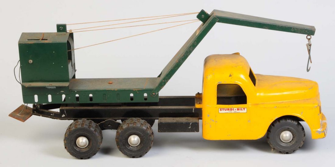 Sturdy Built Crane Truck.: Toy appears to be all original and complete. Very dirty and would clean to a better grade. Does have some chipping and scratching throughout. Condition (Good - Very Good). Size 24" L.