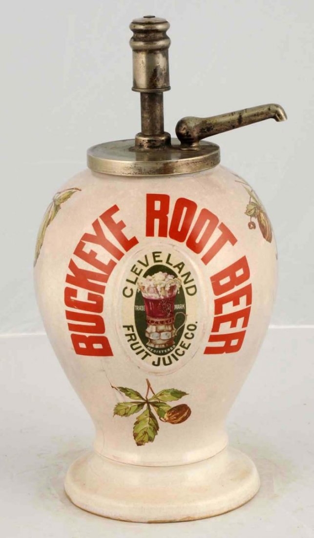 Buckeye Root Beer Syrup Dispenser.: Oval graphics with glass encircled by Cleveland Fruit Juice, shows Buckeye. Original pump says Cleveland Fruit Juice. C.1910. Small chip on upper rim. Minor crazing throughout a small crack on front. 