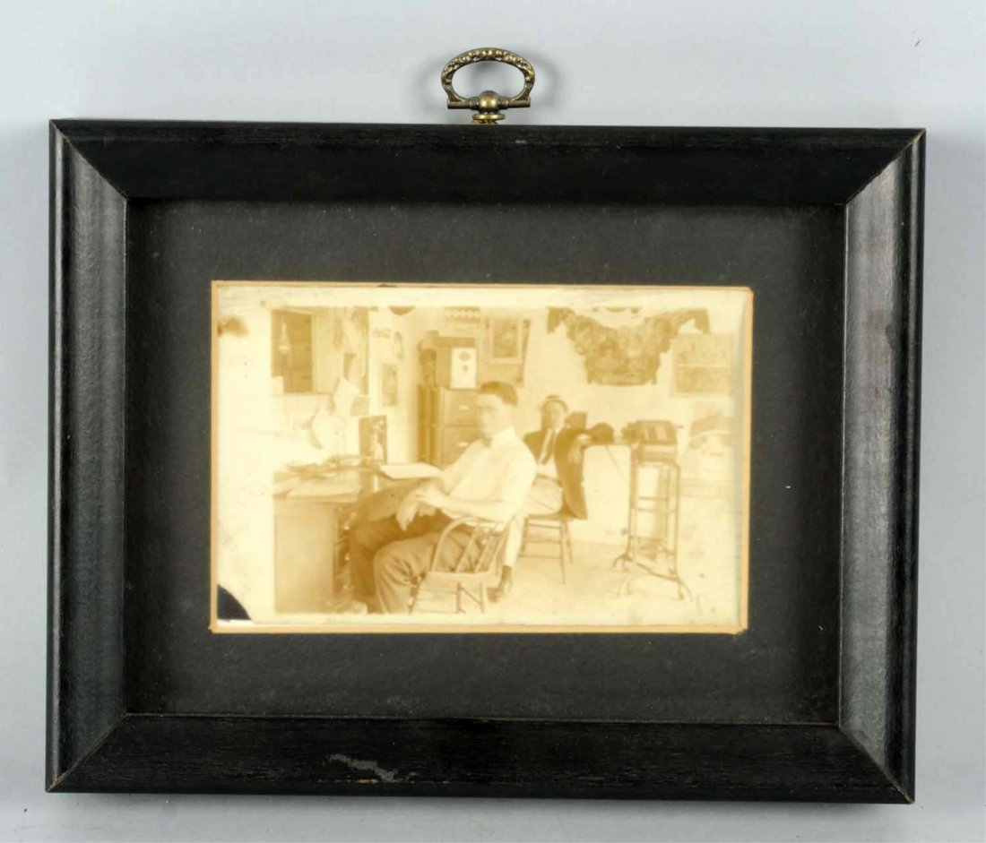 1912-1914 Coca-Cola Real Photo Postcard.: Framed under glass, and post marked 1914. Small corner chip in the lower left. With some great advertising shown on the office wall. Condition (Good - Very Good). Size Framed: 8 - 1/2" x 6 - 3/4".