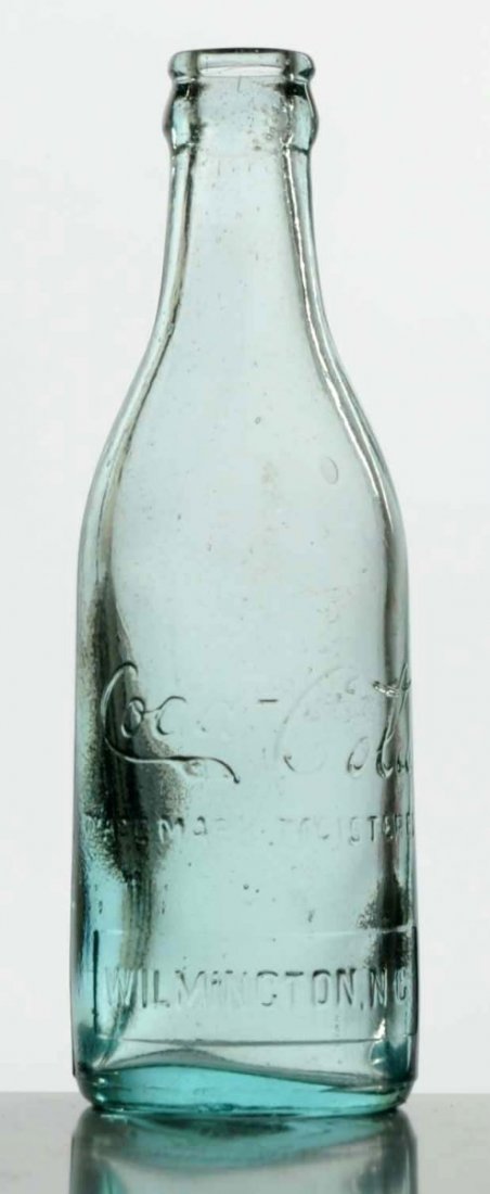 Aqua Wilmington, North Carolina Coca-Cola Bottle.: Good and clean very sound bottle. Condition (Near Mint). Size 7 - 1/2" T.