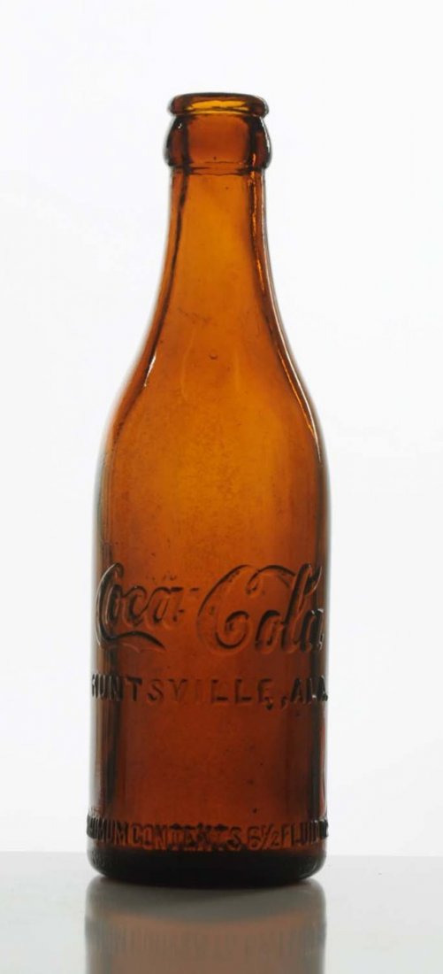 Amber Huntsville, Alabama Coca-Cola Bottle.: Light interior soiling and a few base and body tiny nicks and light scratches. Condition (Excellent Plus). Size 7 - 3/4" T.