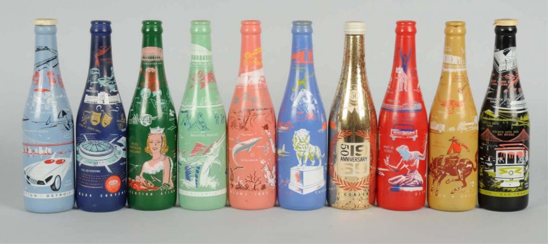 Lot of 10: 1960s NSDA ACL Bottles.: Some wear and flaking on the 1969 bottle otherwise clean and bright. Condition (Near Mint).