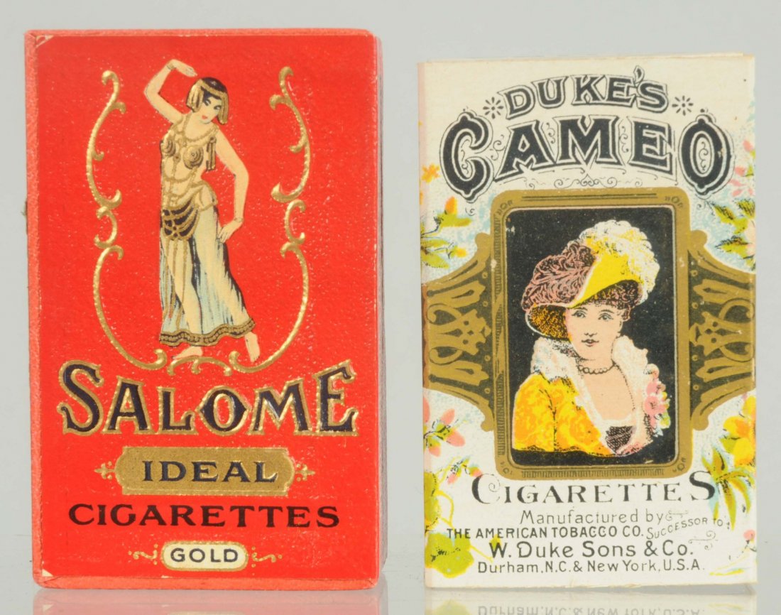 Lot of 2: Cigarette Packs.: Includes Dukes Cameo and Salome. Both are highly graphic and in unopened condition. The Salome still has original tax stamp attached. Condition (Near Mint). Size Largest: 3" T.