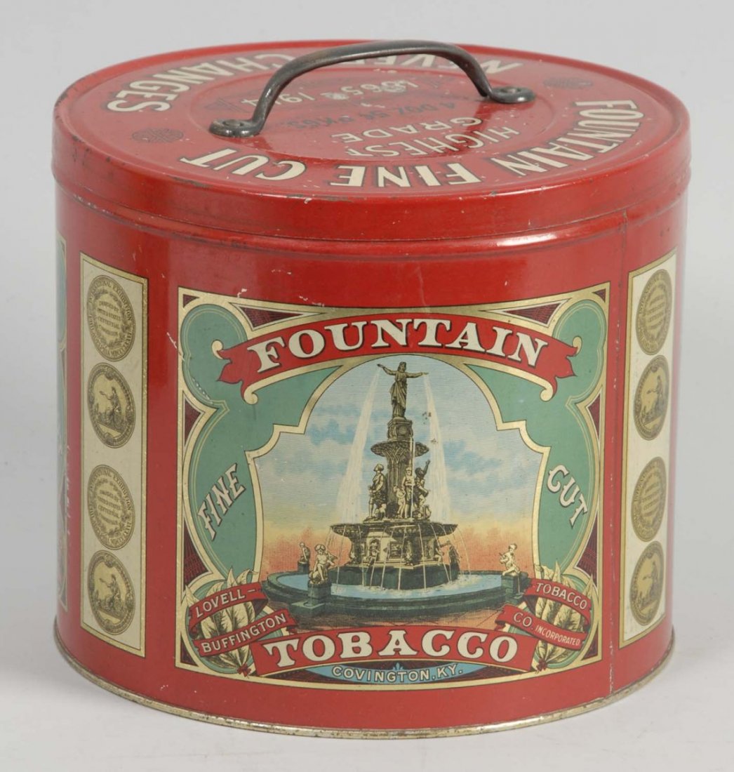 Fountain Fine Cut Tobacco Tin.: Great looking tin. From the La Belle Buffington Tobacco Company. Covington, Kentucky. Fantastic overall visual appearance with great color and overall shine. A few scattered surface nicks and some lig
