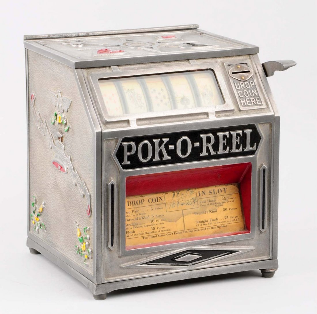 1 Cent - 25 Cent Pok-O-Reel Trade Stimulator.: Original condition. Operates correctly on all coins. Comes with playing cards and key. Condition (Excellent). Size 10 - 1/2" T.