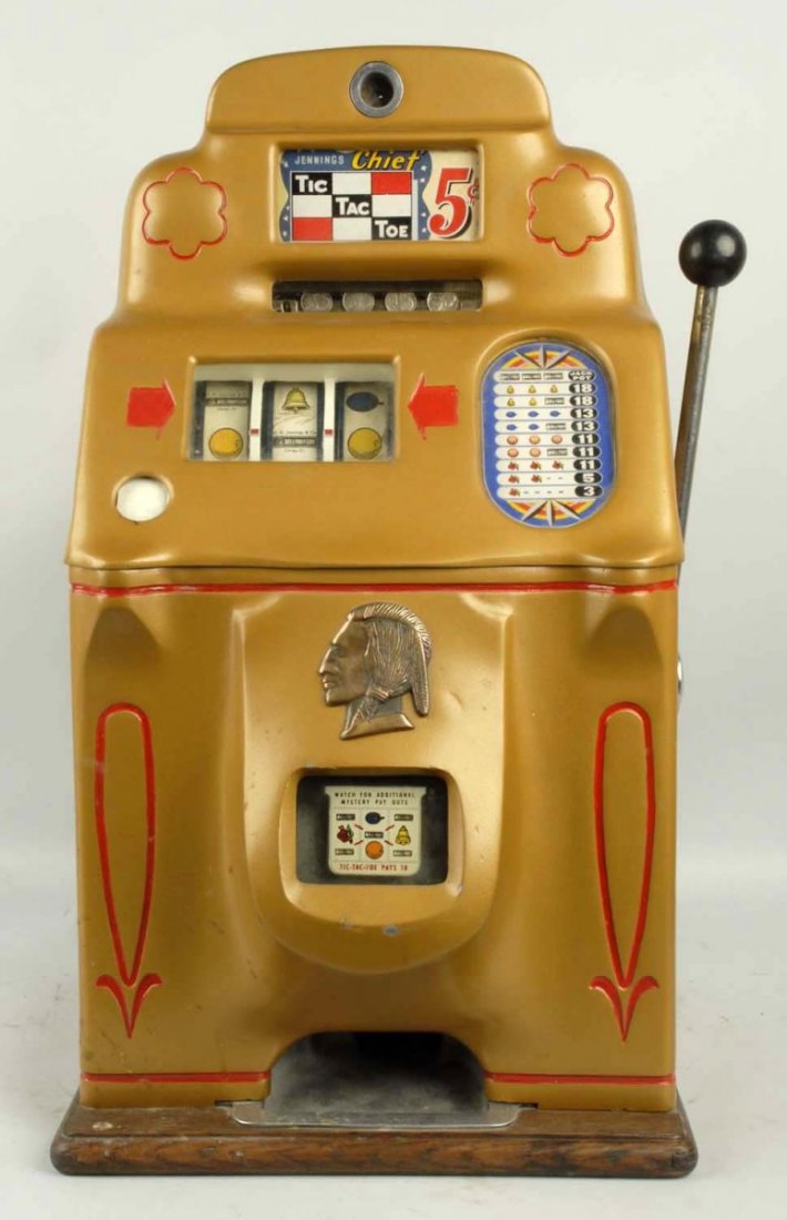Jennings 1946 5¢ Standard Chief Slot Machine.: Tic-tac-toe. Plays and pays. Reproduction back door. No cash box. Condition (Good). Size 27" T.