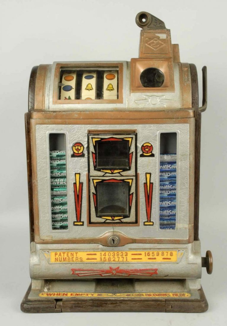 Jennings 1931 5¢ Victoria Vendor Slot Machine.: Vendor functions. Small crack in front casting at the lock. Small chip to wood at front base. Cracking in wood at rear of case. No lower cash door. Has cash box and correct upper door. Condition (Good
